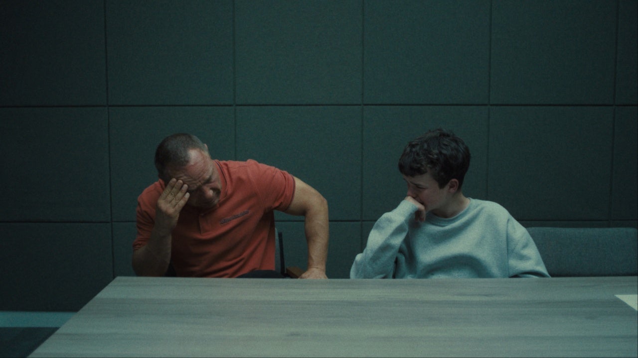 Eddie and Jamie crying in a police interview room in Netflix