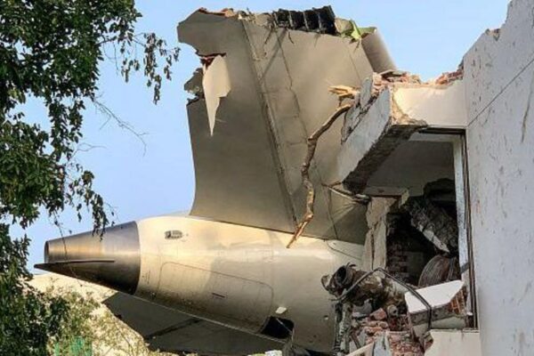 The back of Air India flight 171 is pictured at the site after it crashed in a residential area near the airport in Ahmedabad
