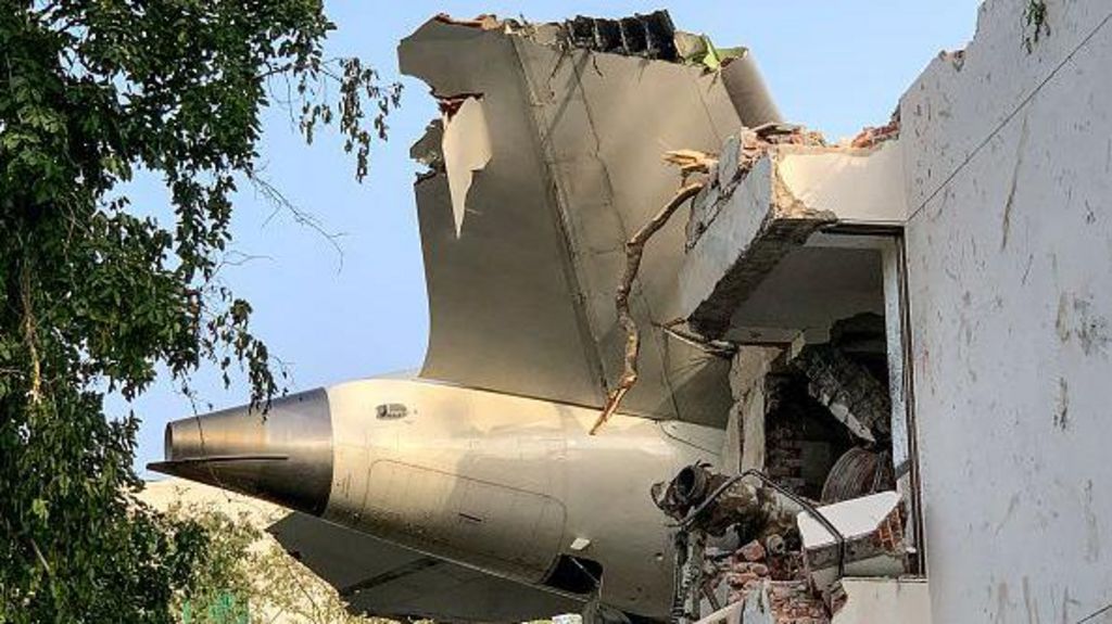 The back of Air India flight 171 is pictured at the site after it crashed in a residential area near the airport in Ahmedabad