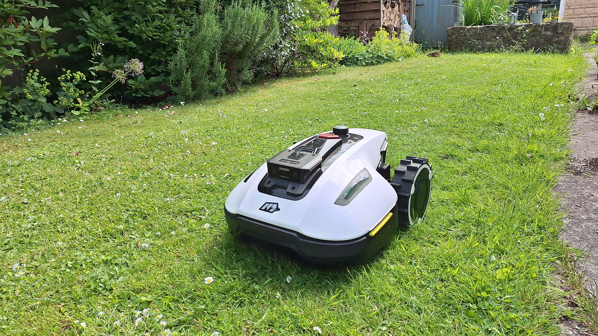 The Mammotion Yuka Mini robot lawn mower in tester