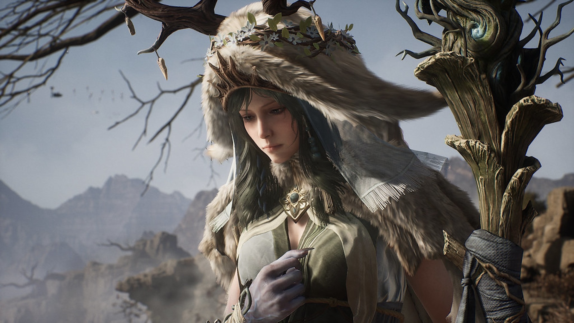 A mage wearing a fur hood, holding a golden staff